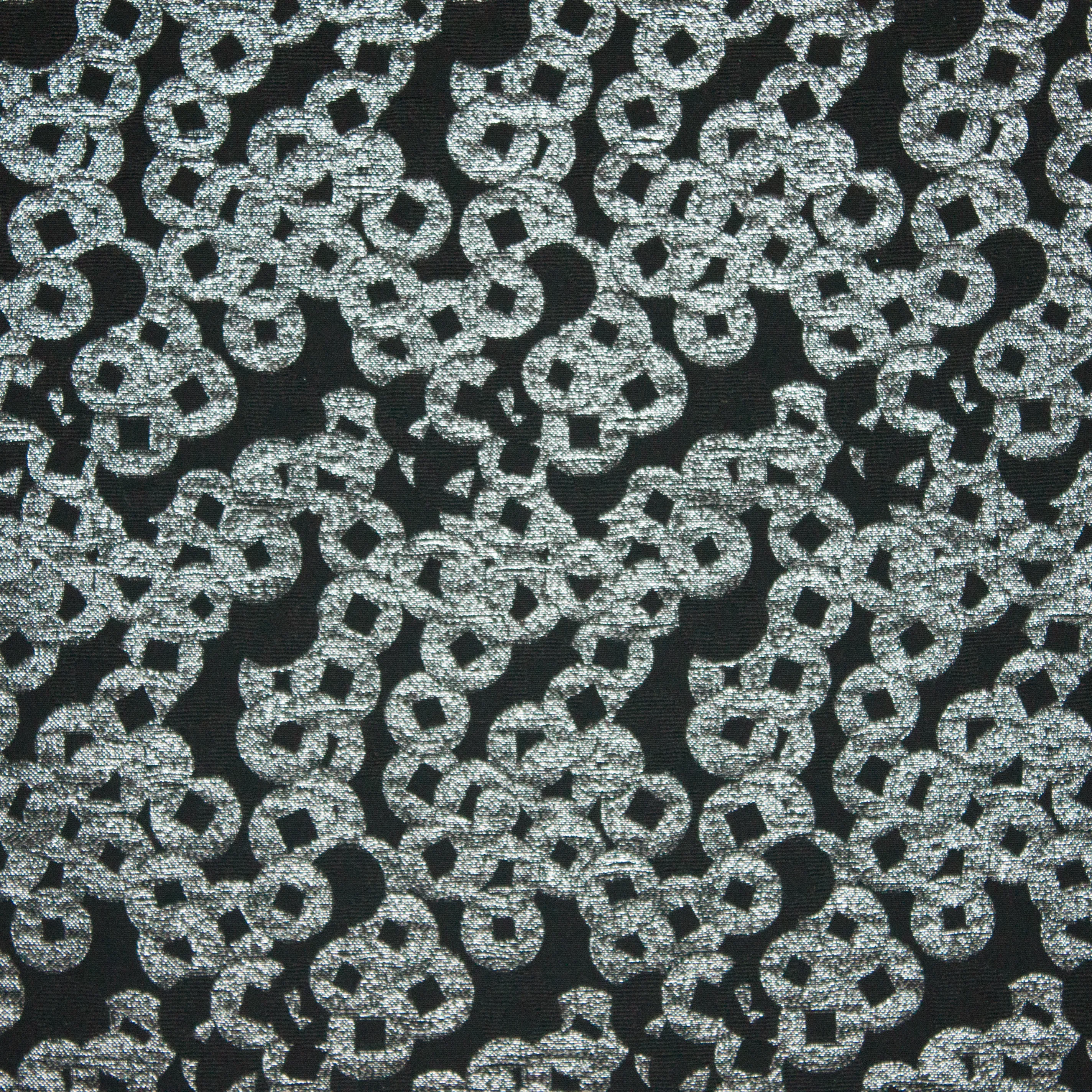 Jacquard met zilveren cirkeltjes